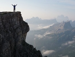 https://www.pexels.com/photo/silhouette-photo-of-a-man-standing-on-the-edge-of-the-mountain-139573/