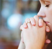 https://www.pexels.com/photo/woman-sincerely-praying-in-focus-photography-192555/